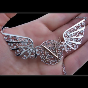 Rarest Element Winged Nd Necklace